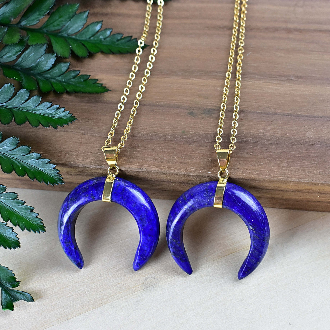 Two lapis lazuli crescent moon pendants on 18-inch gold necklace LV9094