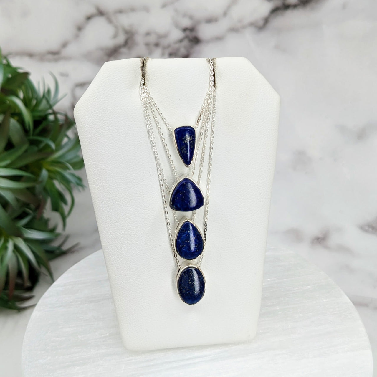 Close-up of Lapis Lazuli Polished Necklace with Blue Stone on Sterling Silver Slider Pendant