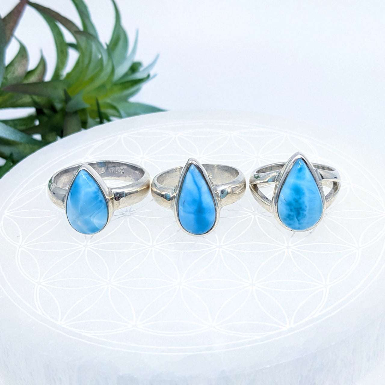 Three silver teardrop rings featuring turquoise blue stones in Larimar S.S. Teardrop Ring LV7010