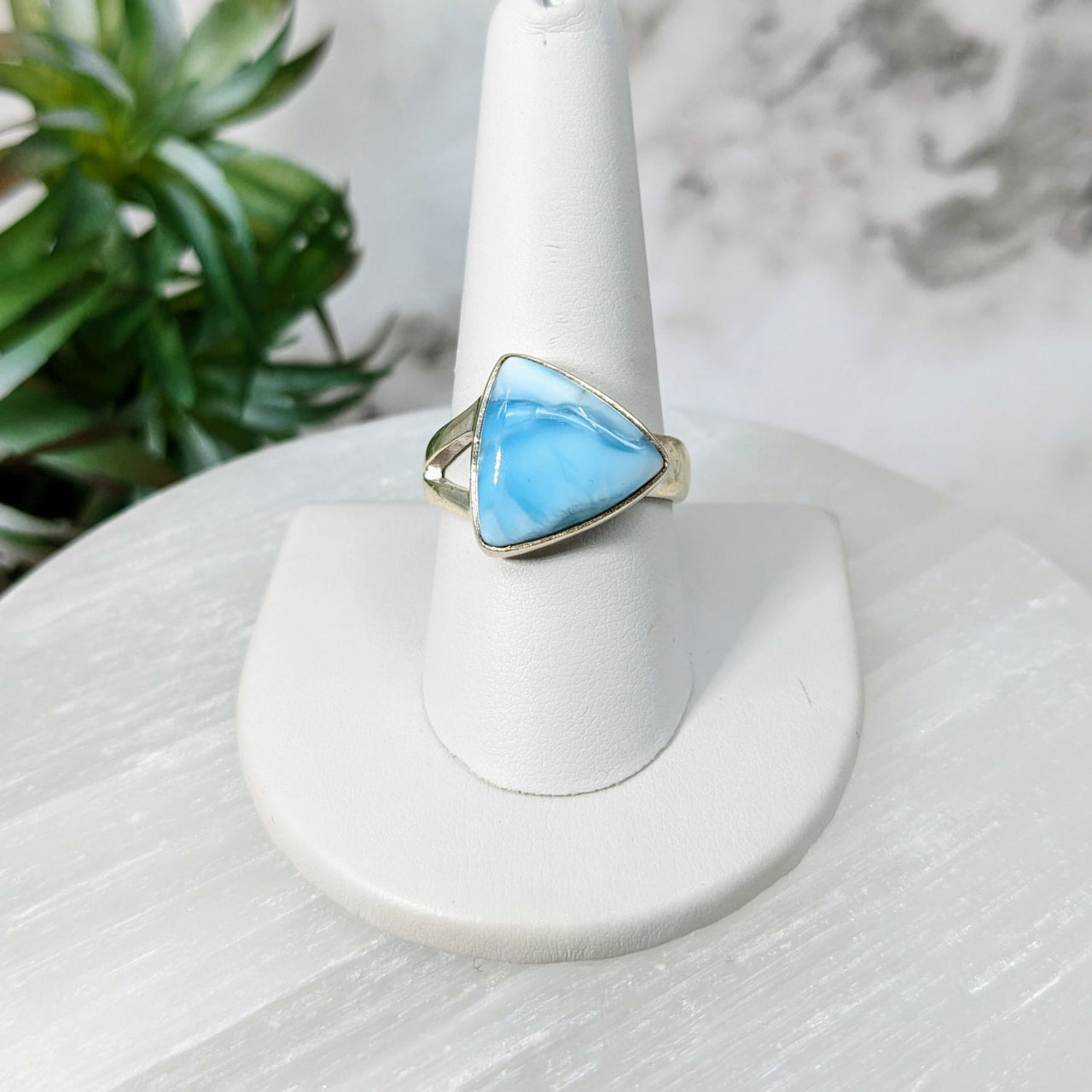 Larimar Sz. 9 S.S. Triangle Ring #LV5037: Blue Stone Ring on White Pedestal