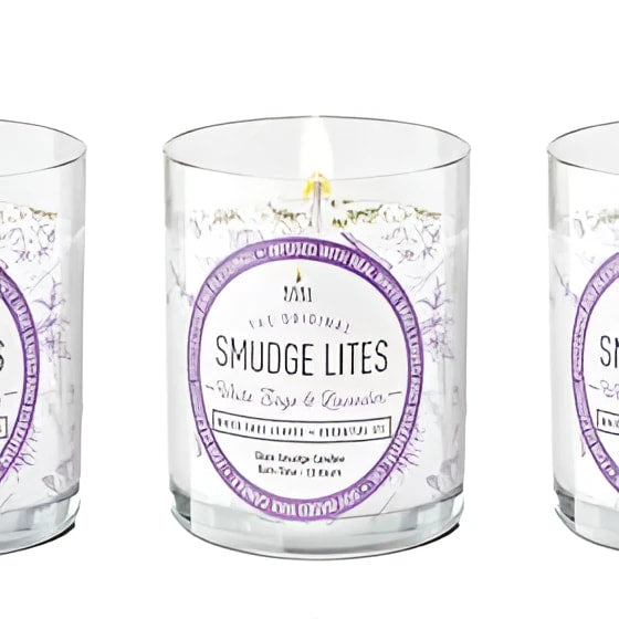 Lit lavender sage smudge candle in clear glass jar with Smudge Lites label