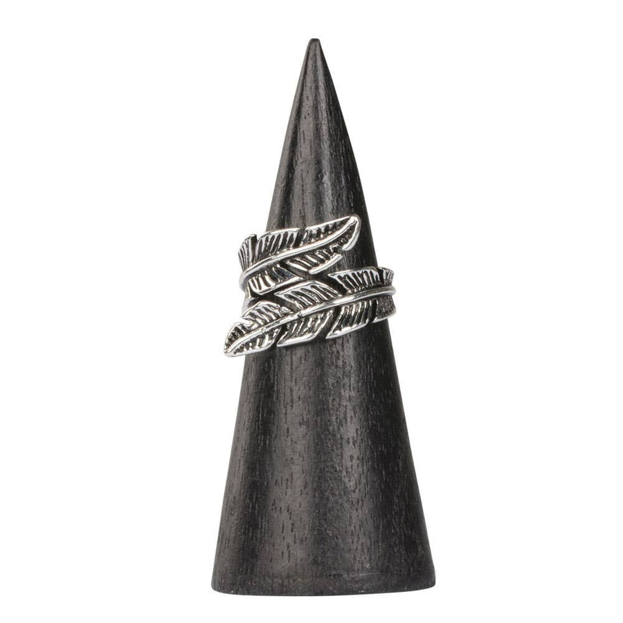 Leaf adjustable ring in silver feather design on dark wooden cone