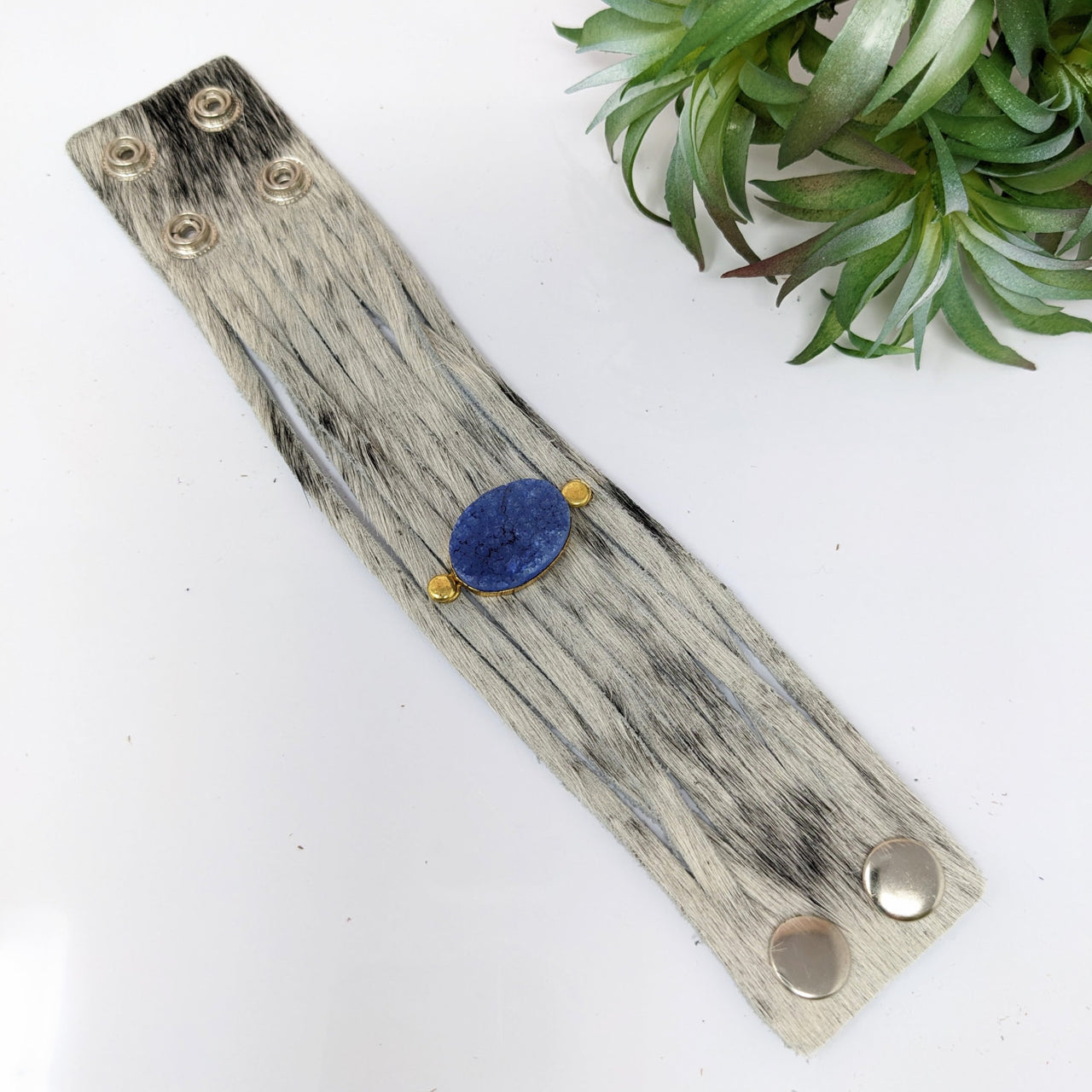 Wooden and metal door handle with blue stone, product: Leather Bracelet 7-8’ 9 Strand #LV2758
