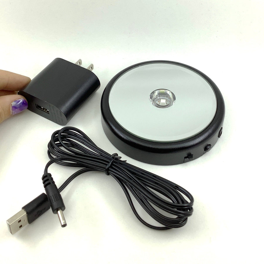 Hand holding LED Light Base Battery Powered or Adapter Cord device #Q060D (No Batteries)