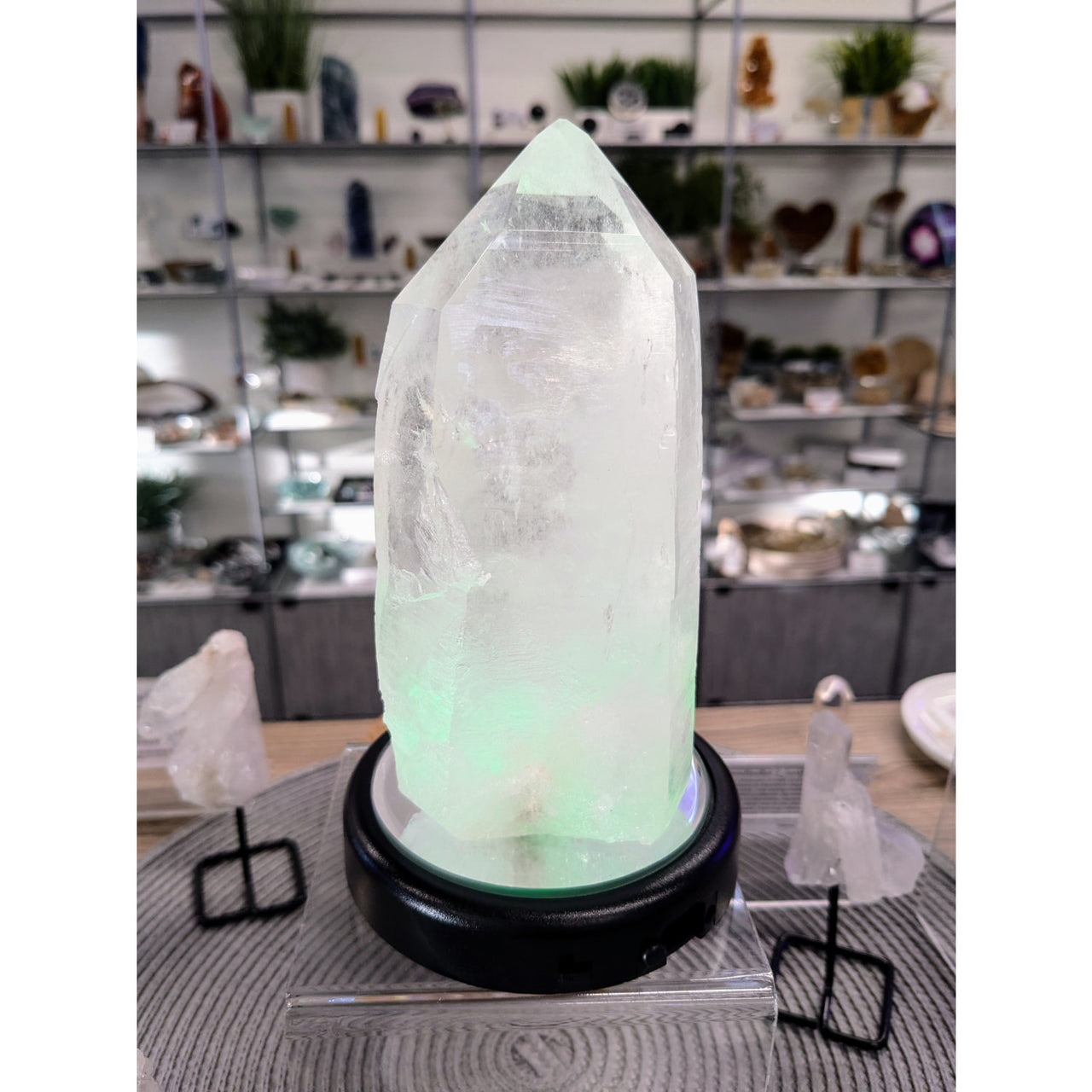 Clear Quartz Crystal Point on Black Base with Green Glow - Lemurian Quartz Semi-Polished Generator