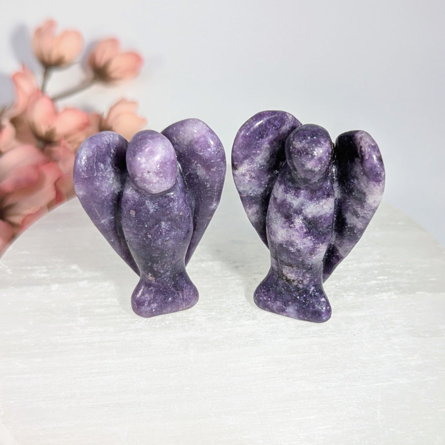 Two polished purple Lepidolite 2’’ amethyst angel figurines with curved wings