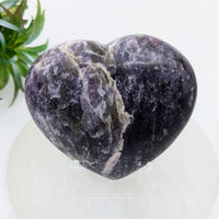 Polished purple heart-shaped Lepidolite stone displayed in product Lepidolite 3-inch Heart #LV7510
