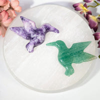 Two hand-carved hummingbird figurines in lepidolite and aventurine jade