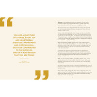 My life in stories book featuring gold foil embossed text and decorative marks on white pages for jewelry and crystals