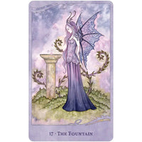 Purple fairy with blue wings by stone fountain in For the Love of Dragons oracle deck