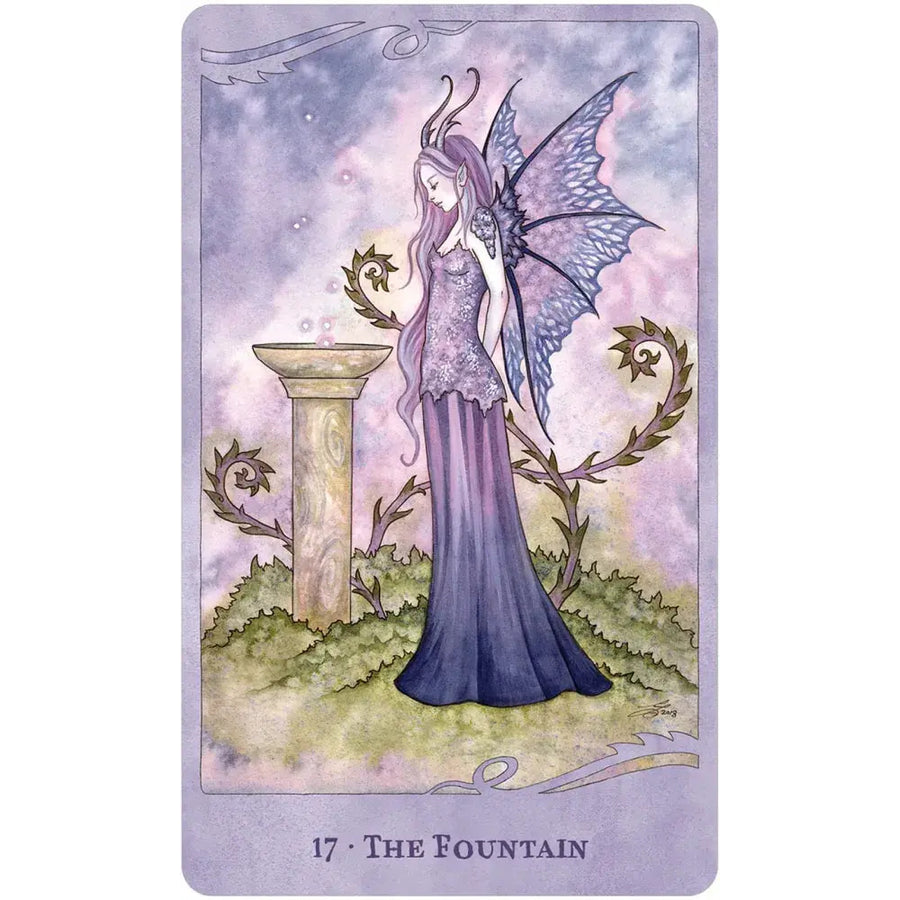 Purple fairy with blue wings by stone fountain in For the Love of Dragons oracle deck