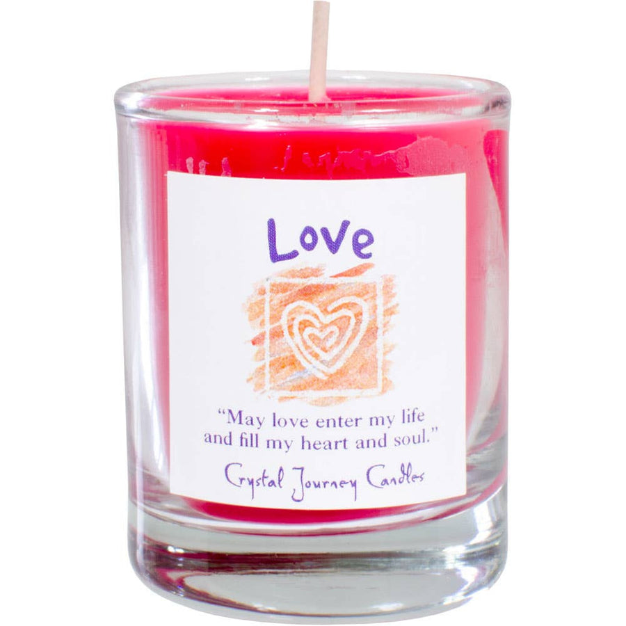 Vibrant pink Love herbal soy votive candle in glass jar with hearts label