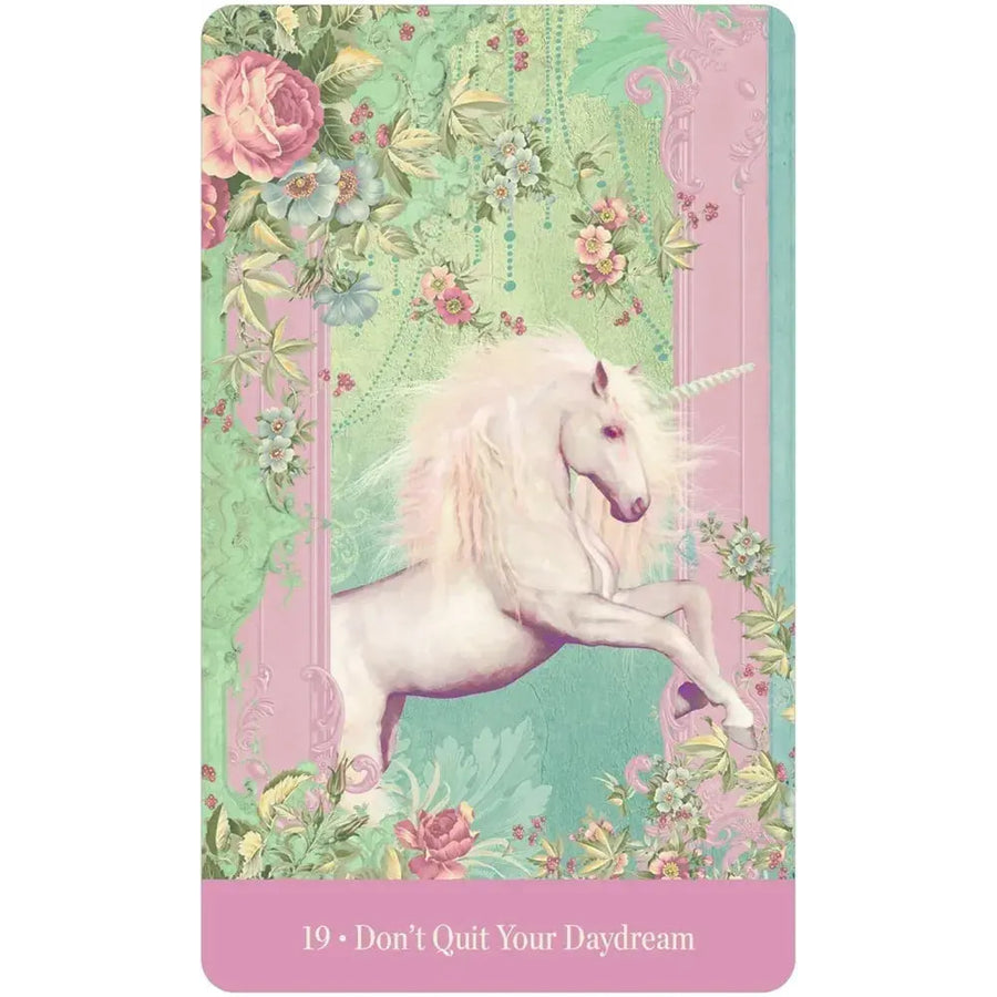 White unicorn with spiraling horn and flowing mane on Love Who You Are Oracle Deck