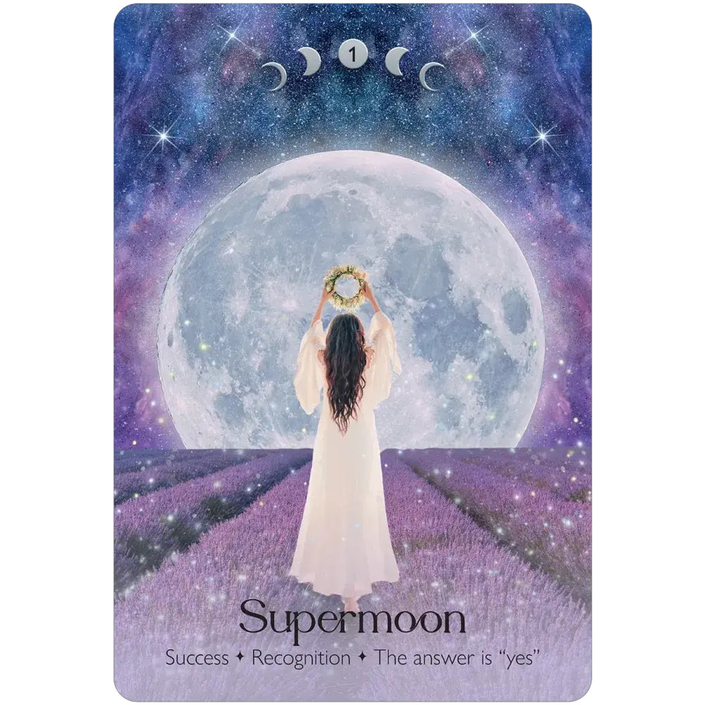 A mystical tarot card from the lunar magic oracle deck showing a woman in white gown before a supermoon and lavender fields