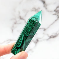 Thumbnail for Hand holding a green marble pen from the Malachite 2.7 - 3.1’ Tower #LV2570 collection