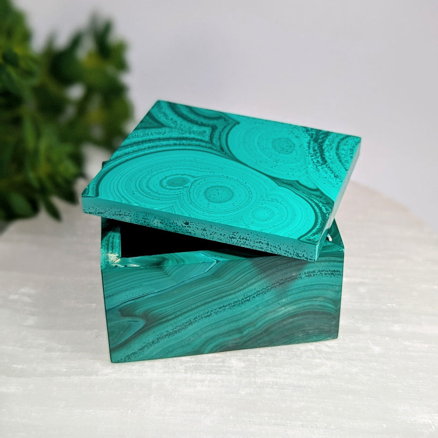 Teal malachite 2-inch square box BC0625 with glossy swirling pattern and open lid