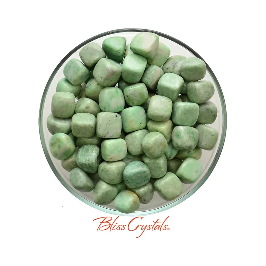 A bowl of green jade pebbles in Mariposite Tumbled Stone aka Green Muscovite #MT12
