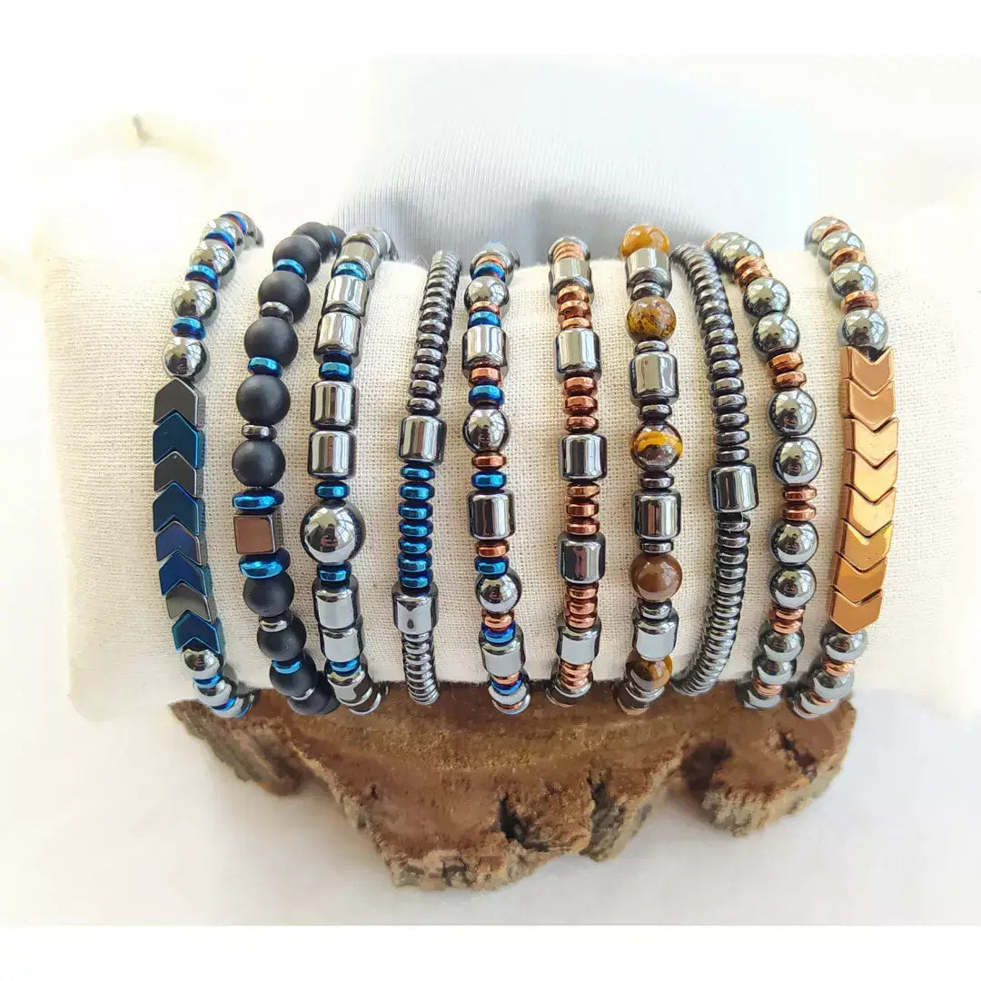 Assorted beaded bracelets featuring Hematite Gemstone onyx and Tiger’s Eye for men