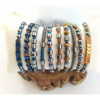 Assorted beaded bracelets featuring Hematite Gemstone onyx and Tiger’s Eye for men