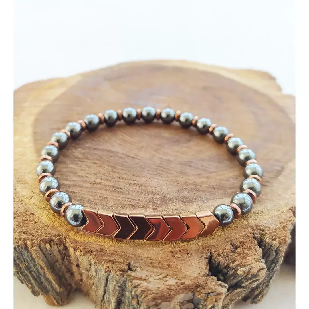 Hematite beaded bracelet with copper-colored arrow accents from Mens 8 Inch Gemstone Bracelets collection