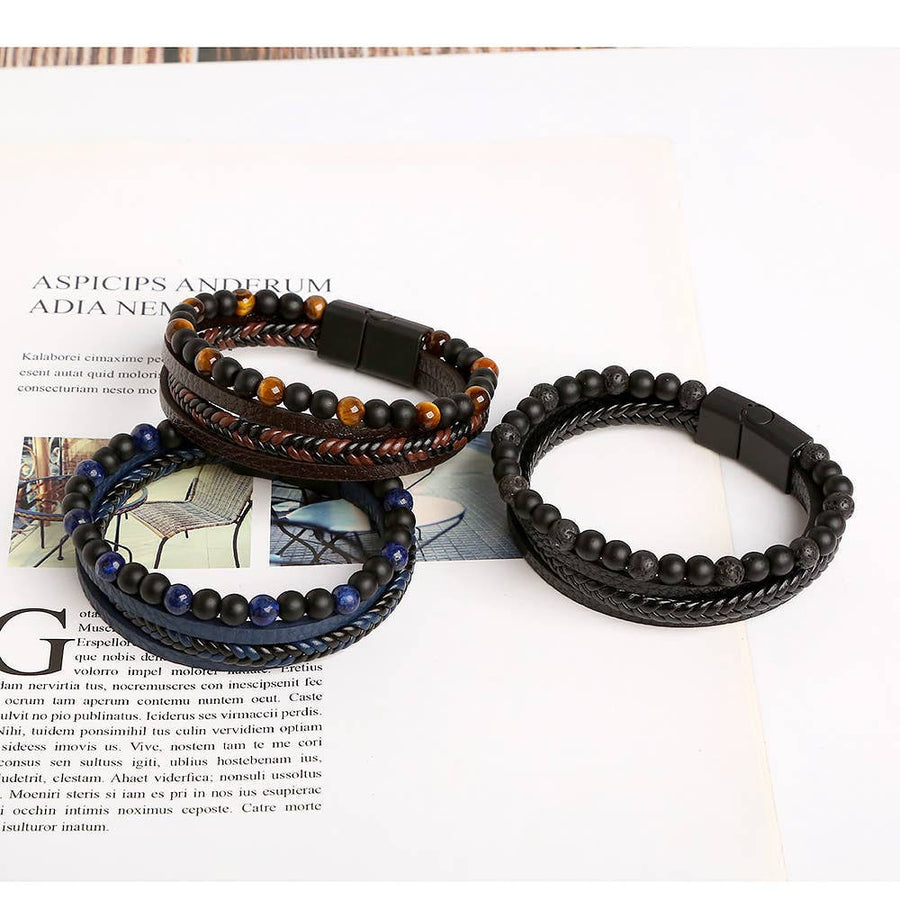 Three multi-strand beaded bracelets on a display for Men’s Leather and Gemstone Bracelets LV7345
