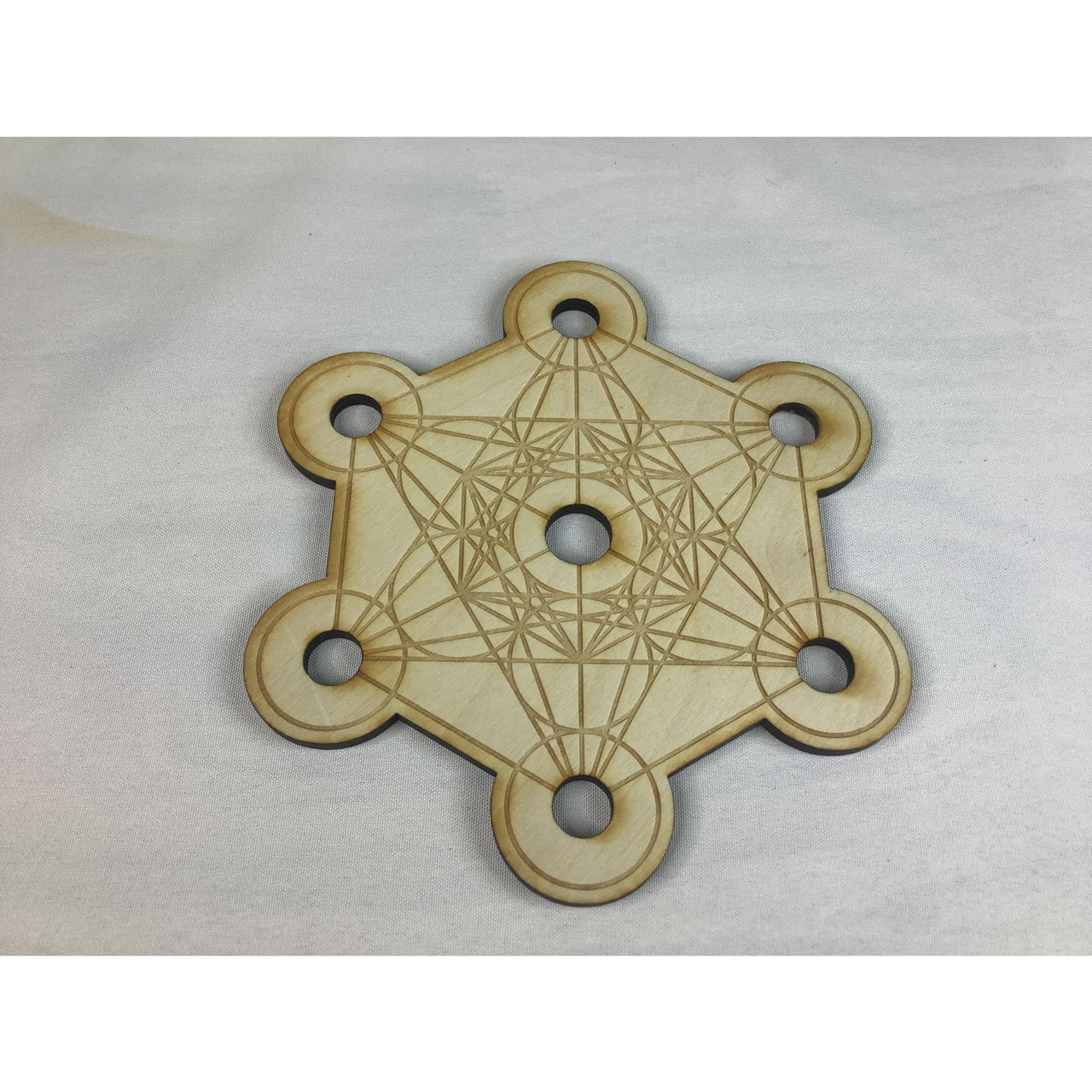 Wooden Metatron’s Cube coaster with 7-hole grid in alder wood