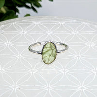 Thumbnail for Delicate silver ring showcasing an oval green Kyanite stone in size 6