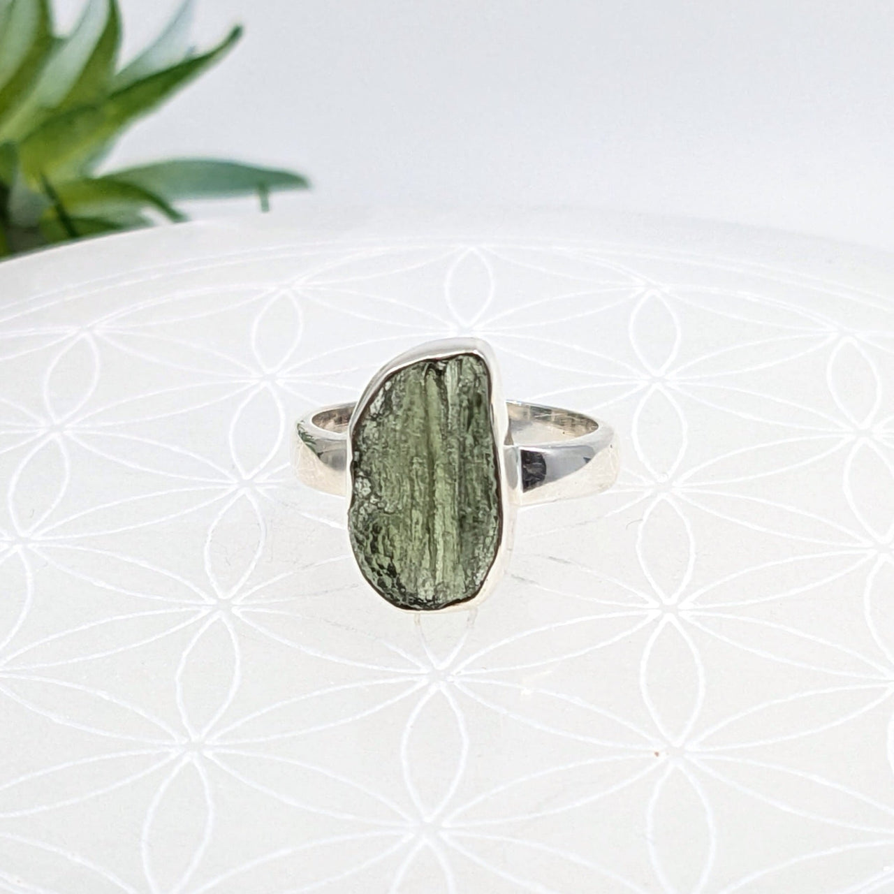 Raw Moldavite crystal set in a sterling silver ring for energy crystals jewelry