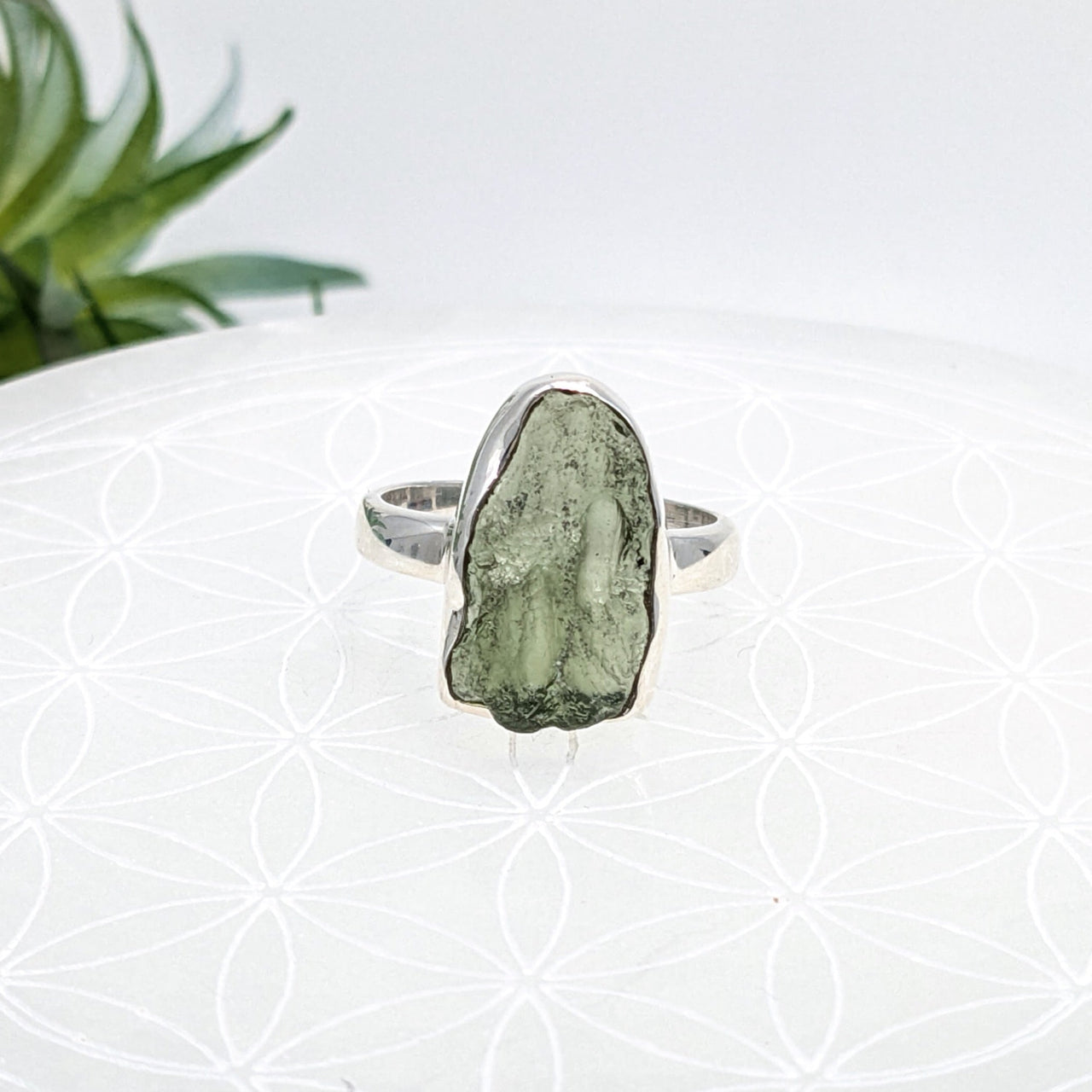 Raw Moldavite crystal set in a sterling silver ring for energy and healing