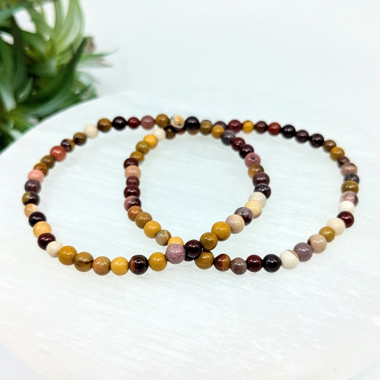 Two Mookaite Jasper 4mm bracelets in earthy brown, yellow, and burgundy tones