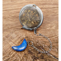 Thumbnail for Moon Crystal Tea Infuser with blue moon and silver chain on a wooden table