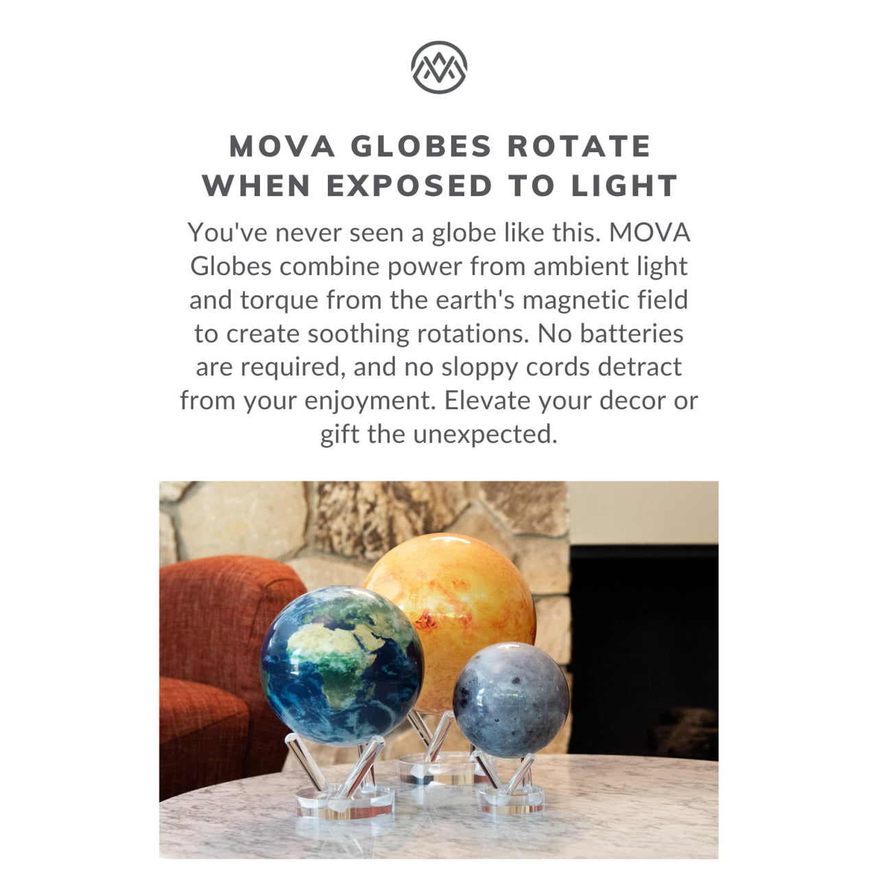 Marble table with three MovA globes featuring Earth’s moon on acrylic bases