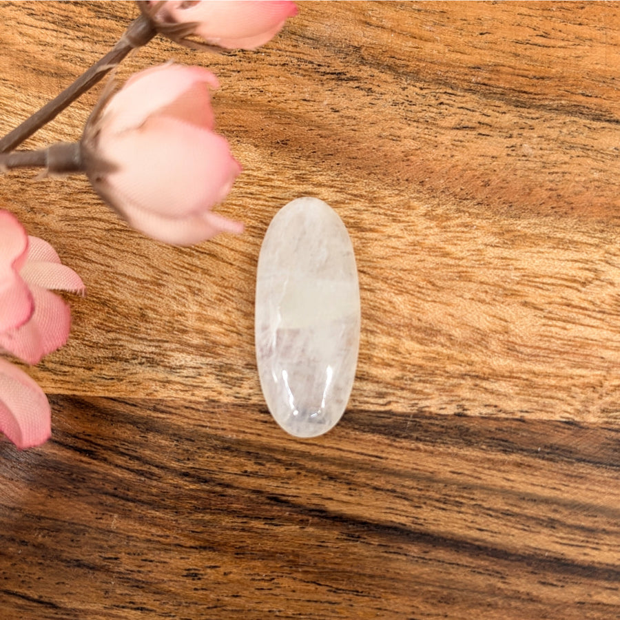 Translucent oval moonstone cabochon displayed in Moonstone 1.1 inch Oval Cabachon #LV7246