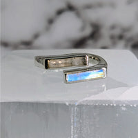 Thumbnail for Moonstone S.S. Split Bar Ring #LV3878 with Blue Stone on White Surface