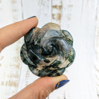 Thumbnail for Hand holding Moss Agate 2.1’ Flower Carving LV1977