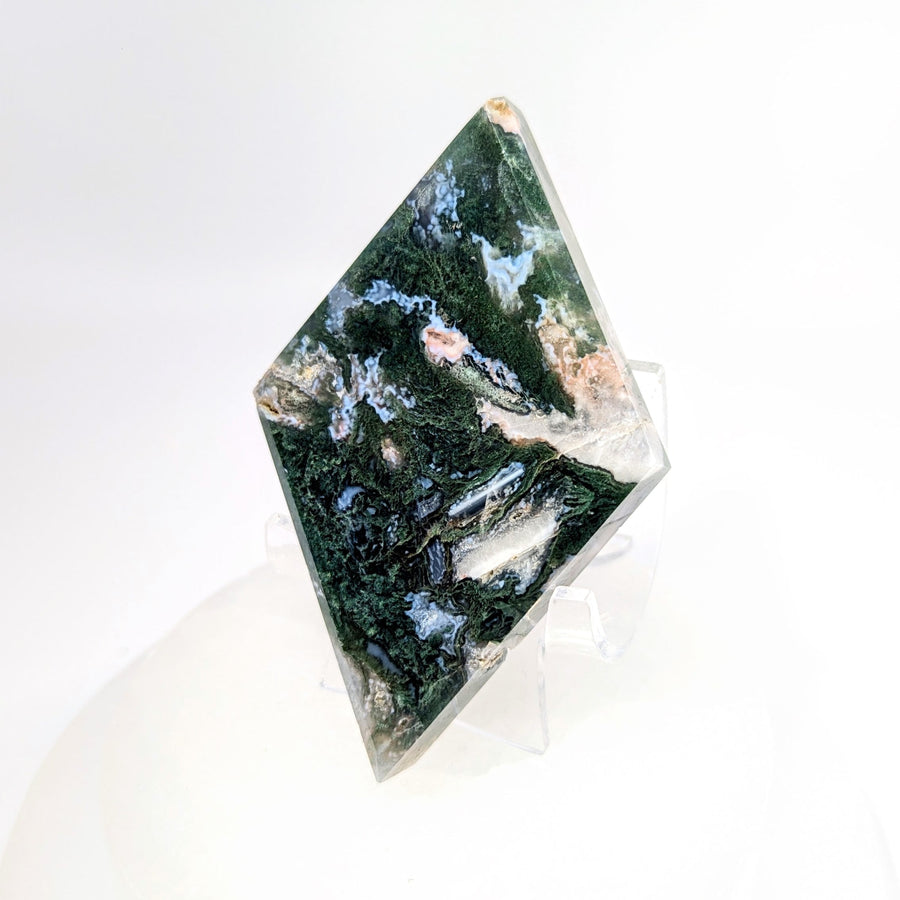 Polished 3.75’’ kite-shaped moss agate specimen with green, blue, pink swirls