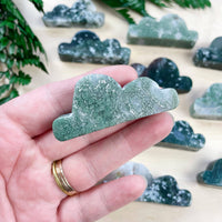 Hand holding Moss Agate Cloud Carving #LV9099 green stone