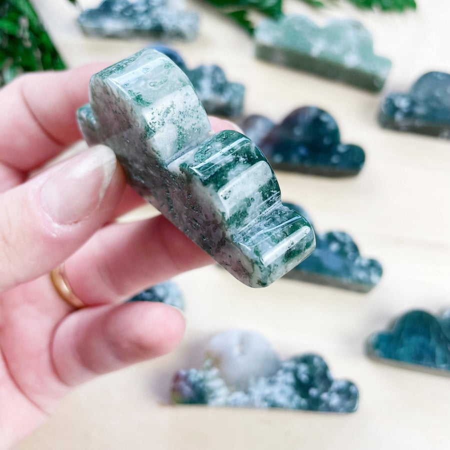 Polished green white moss agate cloud carving LV9099 held in hand