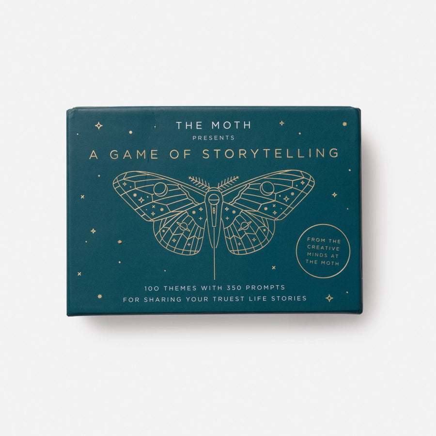 Teal rectangular box featuring a gold-outlined moth design and text the moth presents a game of storytelling for jewelry enthusiasts