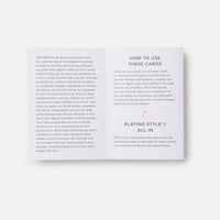 White card deck with minimalist black text detailing instructions for the moth storytelling game by the moth presents, ideal for crystal and gemstone lovers