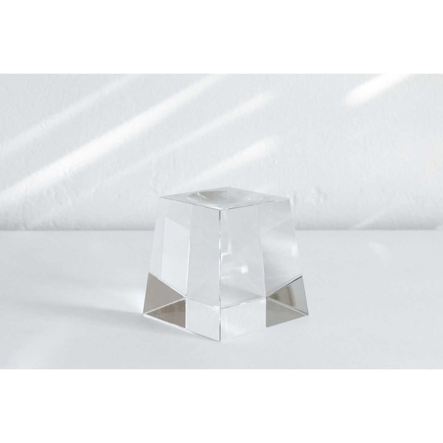 Transparent acrylic cube displayed on Mova Globe Crystal Base for elegant decor