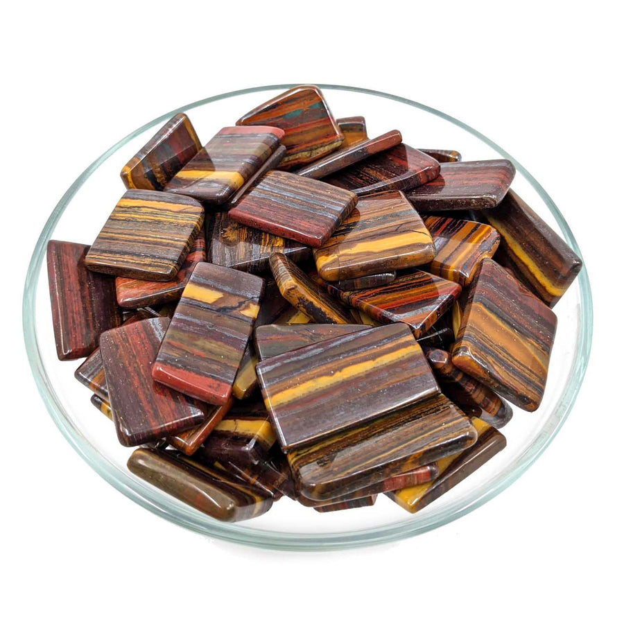 Mugglestone Jasper Grade A Slice SK6304 featuring a pile of Tiger’s Eye gemstones