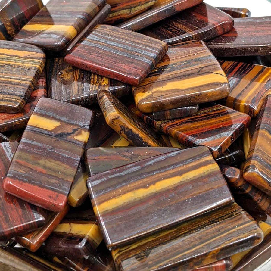 Pile of red and yellow marble blocks in Mugglestone Jasper Grade A Slice #SK6304