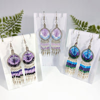 Multi color 2.5 inch web style earrings with purple and blue beads metallic wire frame and dangling gemstone strands jewelry