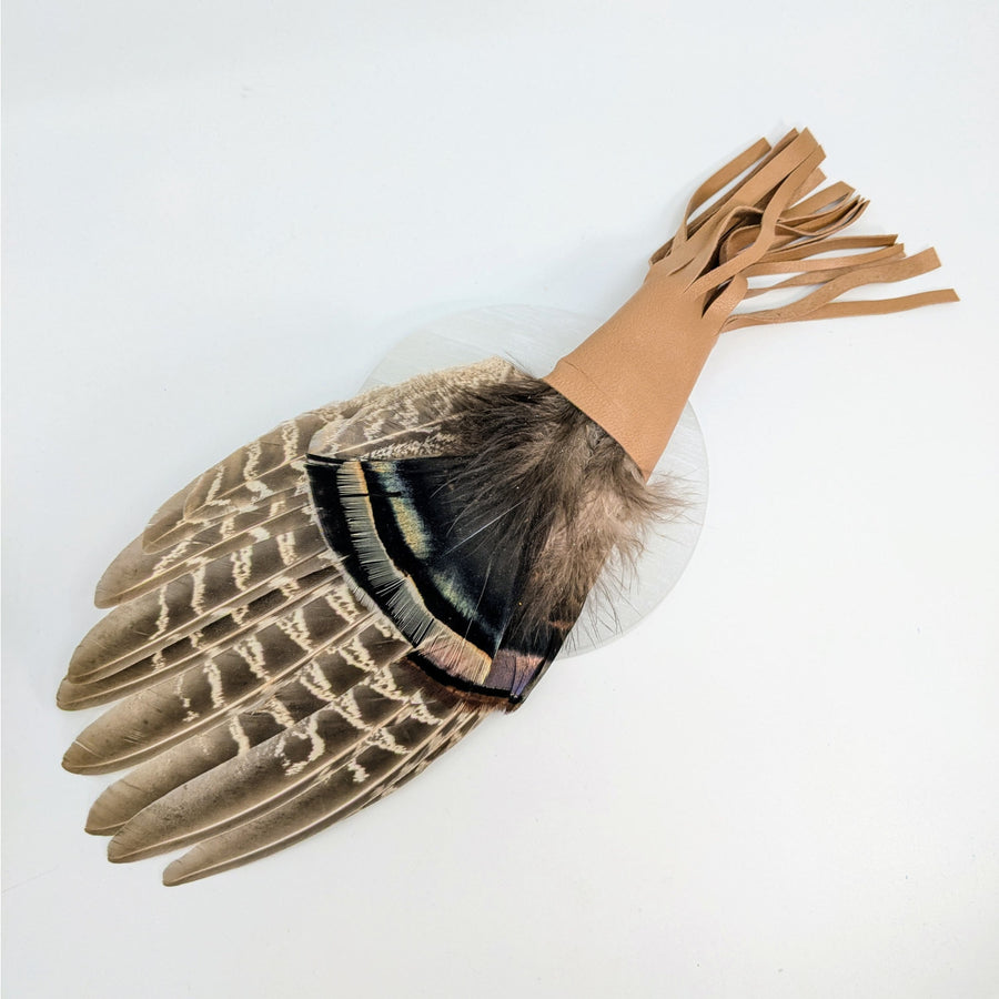 Multi-Feather Smudge Fan with Leather Handle for Sage and Palo Santo showcasing natural feathers