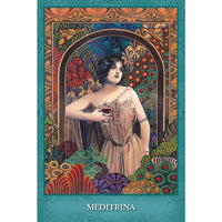 Woman in flowing beige gown with gold details in Mystic Sisters Oracle Deck frame