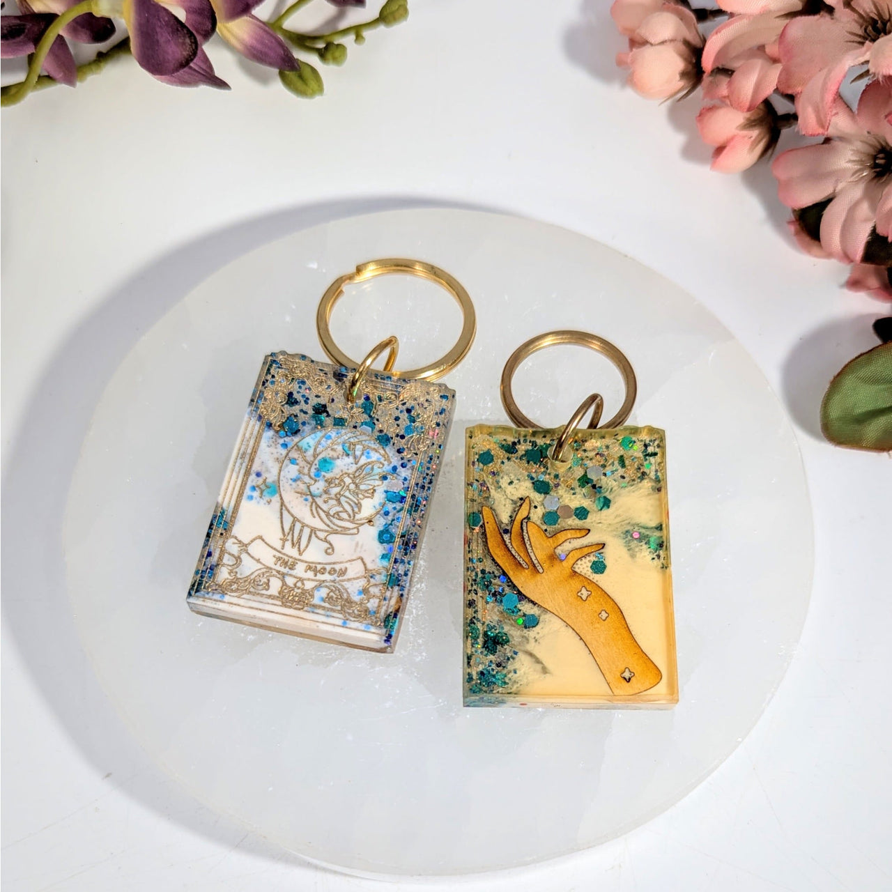 Mystical Hand resin keychain with moon tarot and orange hand designs