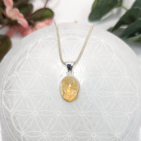 Silver necklace with a natural amber pendant for the Citrine Oval Pendant S.S. #LV8255