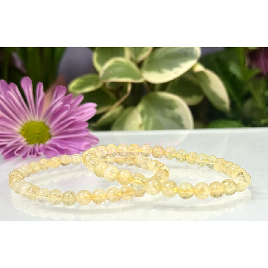 Yellow beaded bracelets made of natural citrine on a 7.5-inch crystal stretch bracelet