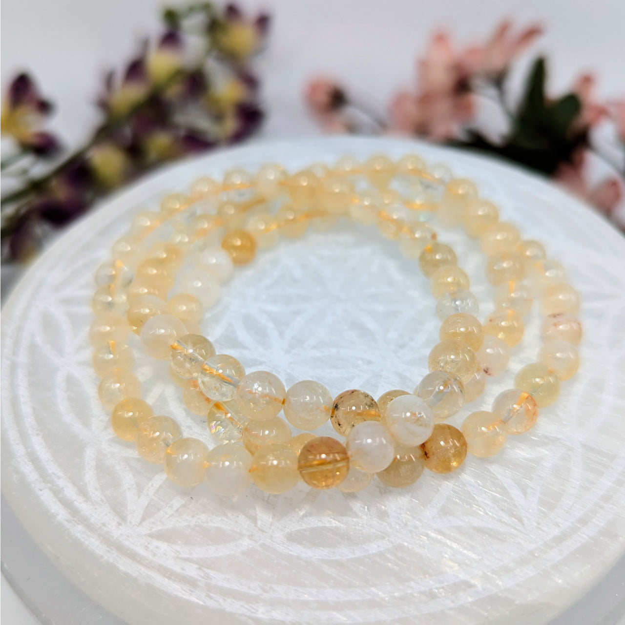 Natural Citrine 6mm crystal stretch bracelets featuring three golden bead bracelets